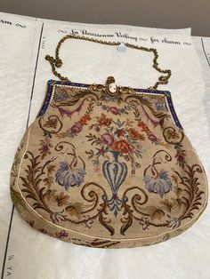 "Stunning Petti point embroidered bag 6.5 \" x  7\".  So lovely, it could be framed. It is strong.  fantastic filigree work in top and enameling. a few repairs that are well done but quite a few. The enamelling on top is amazing." Antique Gold Embroidered Bags, Antique Embroidered Evening Bags, Victorian Style Gold Embroidered Bag, Vintage Evening Bag With Handwork For Formal Occasions, Vintage Embroidered Ceremonial Bags, Handmade Victorian Bags, Victorian Style Rectangular Evening Bag, Vintage Embroidered Pouch Evening Bag, Beautiful Purses