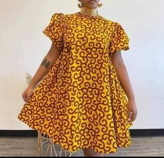 This beautiful dress is made with best quality ankara fabric. It is suitable for any kind of ceremony and outings. It is available in different sizes and prints. It can be adjusted according to buyer's choice. For more details, please feel free to start a conversation with me. Ankara Free Dresses For Women, Floral Print Ankara Fabric Dress, Fitted Short Sleeve Mini Dress In Ankara Fabric, Fitted Short Sleeve Ankara Mini Dress, Ankara Circle Dress, Short Ankara Dresses Classy, Short Ankara Dress, Dress African, Ankara Print