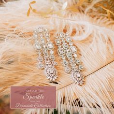 Be splendidly sophisticated in our Janella Earrings! These intricate & elegant earrings feature CZ stones, making it a perfect pick for a special occasion. Approximate earrings length is 3.25". Silver-plated on high-quality brass as base metal. In-stock & ready-to-ship. *Please Note: We use faux stones and beads in all of our jewelry. Faux Stone, Elegant Earrings, Cz Stone, Base Metal, Silver Plate, Silver Plated, Special Occasion, Brass, Beads