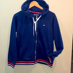 Tommy Hoodie Size Large Brand New Casual Navy Hooded Jacket With Drawstring, Casual Navy Hooded Jacket With Ribbed Cuffs, Tommy Hilfiger Sporty Hoodie For Streetwear, Blue Athleisure Hooded Jacket For Fall, Tommy Hilfiger Winter Hoodie, Navy Casual Hooded Jacket With Double-lined Hood, Tommy Hilfiger Hoodie With Drawstring Hood For Streetwear, Tommy Hilfiger Fall Sweatshirt With Drawstring Hood, Tommy Hilfiger Sporty Sweatshirt With Drawstring Hood