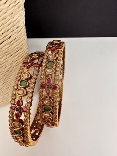 Matte Finish Multi Stone Kada Bangles Traditional Matte Bangles. Please measure your size before ordering as we don't accept returns. Ready to ship from Boston, Massachusetts. If you have any questions please let me know. Thank you!! Traditional Bangles, Kada Bangles, Stone Bangles, Lehenga Red, Gold Bangles For Women, Silk Thread Bangles, Jewelry Board, Thread Bangles, Bangles Design