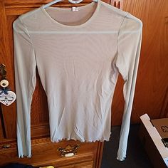 Urban Outfitters "Out From Under" Sheer Long-Sleeve Top In Mint. Never Worn! Ruffle Hem Detailing At Sleeves And Bottom Of Shirt. Size M. Urban Outfitters Crew Neck Tops For Fall, Fitted Long Sleeve T-shirt For Spring, Urban Outfitters Cotton Long Sleeve Top, Spring Stretch Long Sleeve T-shirt, Urban Outfitters Casual Long Sleeve Top, Stretch Tops By Urban Outfitters In Solid Colors, Urban Outfitters Stretch Solid Color Tops, Urban Outfitters Long Sleeve Tops For Spring, Fitted Long Sleeve Blouse By Urban Outfitters