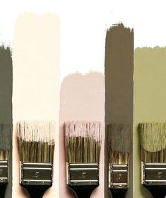 the paint colors are different shades of brown, pink, and green with brush holders