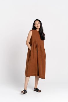 Bombay brown pleated organic cotton dress – World of Crow Brown Cotton Midi Dress For Daywear, Brown Cotton Midi Dress For Work, Brown Daywear Dress With Pockets, Brown Linen Dresses With Pockets, Brown Relaxed Fit Cotton Dress, Long Brown Dress, Indo Western Saree, Handloom Fabric, Overlay Skirt