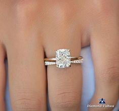 The given price is only for the ring. Band isn't included.  ✨ Discover the Epitome of Elegance at Diamond Vishwa ✨ Step into a world of timeless romance with our Luxurious Moissanite Diamond Engagement Ring. Exquisitely handcrafted to symbolize your unique love story, this antique solitaire is a masterpiece of design and craftsmanship. Nestled within a majestic setting, the brilliant moissanite diamond radiates a fire and brilliance that rivals the stars. At Diamond Vishwa, we take pride in crea Cushion Cut Engagement Ring And Band Set, Popular Engagement Rings 2024, Engagement Ring And Wedding Band Set, Cushion Solitaire Engagement Ring, Square Engagement Ring, Elongated Cushion Cut, Elongated Cushion, Cushion Cut Moissanite, Ring Elegant