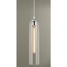 a light fixture hanging from the ceiling with a clear glass tube and metal fittings