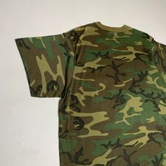 80's woodland came pocket t shirt crafter with pride in America Great condition signs of wash wear on shirt body Chest-22 Length-29 Military Style Crew Neck T-shirt For Streetwear, Camouflage Military Style Tops For Streetwear, Camouflage Cotton Short Sleeve T-shirt, Military Cotton Shirt For Streetwear, Cotton Military Shirt For Streetwear, Green Military Style Tops With Graphic Print, Military Style Cotton Shirt For Streetwear, Military Style Green Tops For Streetwear, Green Military Style Short Sleeve Top