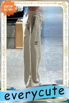 Embroidered Straight Leg Casual Sweatpants Embroidered Straight Beige Pants, Casual Embroidered Winter Bottoms, Beige Embroidered Straight Pants, Embroidered Wide Leg Beige Pants, Casual Embroidered Pants For Loungewear, Embroidered Beige Wide Leg Pants, Embroidered Wide-leg Beige Pants, Casual Embroidered Straight Leg Bottoms, Fall Embroidered Wide Leg Pants