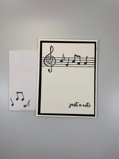 two greeting cards with musical notes on them