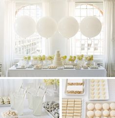 the dessert table is decorated with white balloons