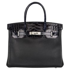 A gorgeous Hermès Touch Birkin 30 cm bag. The exterior of this Birkin "Touch" features noir taurillon novillo and bleu marine niloticus lisse leather with palladium hardware. The exterior is complete with tonal stitching, two straps with front toggle closure and double rolled croc handles. The interior is lined with noir taurillon novillo and has a zipper pocket with an Hermès engraved zipper pull and an open pocket on the opposite side. The bag comes store fresh with full set, complete with fac Birkin 30, Hermes Accessories, Kelly Bag, Togo Leather, Handbags And Purses, Vintage Hermes, Handbag Heaven, Novelty Bags, Hermes Handbags