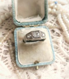 Beautiful Antique French Silver and Clear Stones Ring, Art Deco Three Stones Ring, Gift for Woman or Man Size:  US - 7,5 UK - P France - 56 Diameter inside - approx. 17,9mm / 0,70" Decorative part - width 8,5-6,5mm / 0,33" - 0,25" , length 17,5mm / 0,69", height in the middle - 4mm / 0,16" Stones - 6mm / 0,23" big one in the middle, 4mm / 0,15" smaller ones Width of the band on the bottom of the ring - approx. 3mm / 0,12" Weight - 5,16g Beautiful ring, elegant and sophisticated, in a great antiq Heirloom Hallmarked Diamond Ring For Marriage, Antique Signet Ring For Anniversary, Antique Signet Ring With 17 Jewels For Anniversary, Vintage White Gold Promise Ring Jewelry, Heirloom Hallmarked Diamond Wedding Ring, Antique Diamond Cut Round Band Jewelry, Estate Platinum Jewelry For Anniversary, Art Deco Hallmarked Filigree Wedding Ring, Antique Silver Signet Wedding Ring