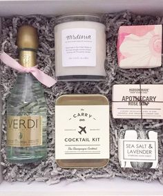 an open box containing various items from the brand, including soaps and lotions