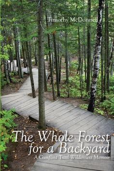 the book cover for the whole forest for a backyard, featuring a wooden path in the woods