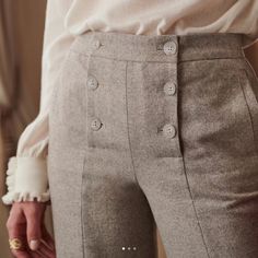 Button In Natural Horns // Double Button Placket // Straight-Leg Trousers // Inlaid Pockets On The Sides With Single Piping // 50% Wool 48% Cotton, 2% Elastane // Made In Bulgaria // Inseam 29 Inch // Bottom Leg Width: 9.5 Inch, Lay Flat // Waist 13 Inch Lay Flat // Hip 16 Inch, Lay Flat // Rise: 11.5 Inch Please Note: While The Item Is New With Tag And Never Worn, The Hem Was Professionally Hastened To Create Belt Loops Around The Waist (Alteration Price For Belt Loops Is Not Included In This I Classy Womens Pants, Luxury Elegant High-waisted Chinos, Luxury Cotton Work Pants With Straight Hem, Luxury Straight Hem Bottoms For Spring, Luxury Workwear Dress Pants With Standard Cut Leg, Chic High Waist Dress Pants Cheap, Luxury Straight Leg Women's Culottes, Tailored Luxury Ankle-length Work Pants, Luxury Straight Fit Cropped Leg Bottoms