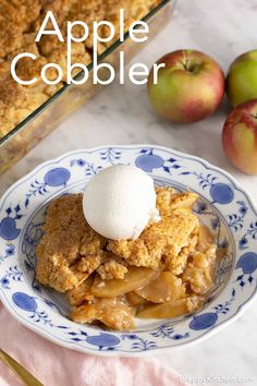 an apple cobbler on a blue and white plate