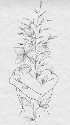 a tattoo design with flowers and a ribbon on the back of its arm, in black and white