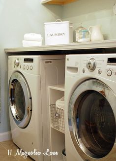 a washer and dryer sitting next to each other