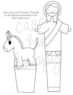 the paper doll is standing next to a cup with a horse in it and an image of jesus