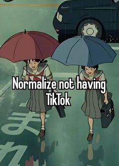 two people walking down the street with umbrellas over their heads, and one person is holding