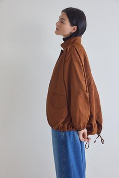 Constructed from high-quality, weather-resistant materials, our Oversized Windbreaker Jacket is ready to tackle any element with ease. The lightweight fabric provides protection against wind and light rain, making it the ideal companion for unpredictable weather conditions. Zips up Long sleeves Oversized Oversized Windbreaker Outfit, Oversized Windbreaker, Windbreaker Outfit, Spain Trip, Poplin Blouse, Chestnut Color, Wind Jacket, Oversized Tunic, Light Rain