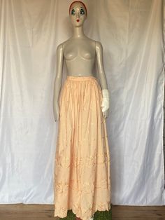 "This gorgeous and full vintage maxi skirt comes in a standout light beach and features embroidery all the way down the skirt . It fastens at the back with a hidden zip and matching peach beach button. Measurements      Waist 26\"     Hips 46\"   Length  40\"  Skirt   84\"    At The Yesterday Society, we pride ourselves on the quality of the grade A vintage items in our collection. All listings are in first class condition unless otherwise stated. Check out these similar items https://etsy.me/3p Floral Embroidered Full Skirt For Spring, Floral Embroidered Full Skirt Bottoms, Floral Embroidered Full Skirt For Summer, Flowy Full Skirt With Floral Embroidery, Spring Floral Embroidery Maxi Skirt, Spring Floor-length Lined Skirt, Spring Floral Embroidered Maxi Skirt, Summer Full Skirt With Floral Embroidery, Floral Embroidered Maxi Skirt