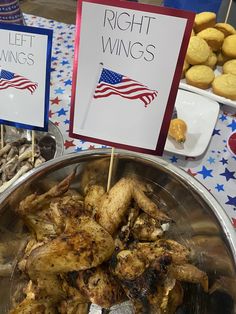 there are two signs that say right wing wings and left wing wings on the table