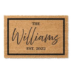 the williamss door mat with black lettering on it