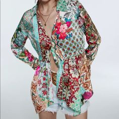 Brand New With Tag Beautiful Top With Patchwork Details Size: Small No Stains / Holes Lapel Collar Top With V-Neck And Long Sleeves. Adjustable Waist With Self-Tie. Asymmetric Hem. Front Button Closure. Outer Shell 100% Polyester Long Sleeve Patchwork Top For Vacation, Multicolor Long Sleeve Top With Floral Patchwork, Multicolor Floral Patchwork Long Sleeve Top, Patterned Long Sleeve Top With Mixed Print, Long Sleeve Patterned Top With Mixed Print, Spring Patchwork Patterned Shirt, Zara Multicolor Long Sleeve Blouse, Zara Multicolor Floral Print Blouse, Zara Multicolor Long-sleeved Blouse