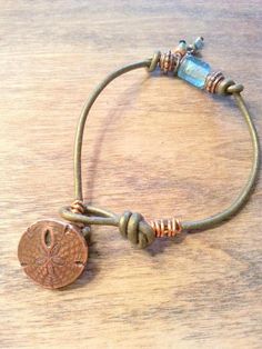 Bohemian Leather Bracelet For Beach, Artisan Brown Bracelet For Beach, Adjustable Bohemian Bracelet With Recycled Glass, Earthy Hand-wrapped Bracelets For The Beach, Sea Glass Leather Bracelet, Natural Crafts, Stretchy Beaded Bracelet, Beach Wave, Bronze Patina