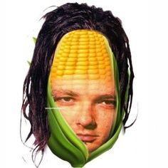 a man with dreadlocks and corn on his head