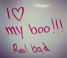 i love my boo real bad written on a whiteboard with pink marker and heart