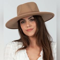 Their Bestselling Vegan Felt Rancher Hat. Get This Classic Statement Hat To Spruce Up Your Look! Sold In A Wide Assortment Of Colors, Shop Limited Edition And More! Adjustable Inner Drawstring 100% Polyester Size: Brim: 3.75 In. Crown Height: 4 In. Beige Fedora Hat For Fall, Classic Brown Felt Hat For Spring, Chic Brown Fitted Felt Hat, Chic Fitted Brown Fedora, Chic Fitted Brown Felt Hat, Beige Wide Brim Boater Hat For Fall, Chic Beige Fedora For Fall, Chic Fitted Beige Fedora, Chic Fitted Boater Hat For Fall