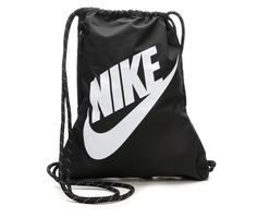 Be ready for your day in a cinch with this eye-catching drawstring athletic bag. The Nike® Heritage Gymsack features side zipper for storage and bold Nike® branding elements for added style! 100% polyester construction and lining, Large main compartment with drawstring closure, Side access pocket with zipper closure, Approx. 17 inches H x 13 inches W when laid flat, Nike® branding details | Nike Heritage Gymsack Drawstring Bag in Black White Casual Sports Bags With Logo, Sporty Logo Bags For Streetwear, Casual Sports Backpack Gym Bag, Casual Sports Bag With Drawstring, Sporty Nike Bags For Outdoor Activities, Casual Gym Bag With Drawstring, Nike Sporty Bags For Outdoor Activities, Sporty Drawstring Bag For Everyday, Casual Bags With Logo For Outdoor Activities