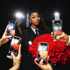 three women holding up their cell phones in front of them with roses on the screen