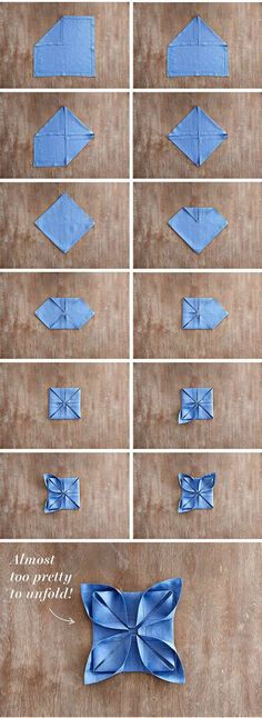 an arrangement of blue paper folded in squares and rectangles on a wooden surface