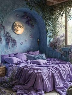 a bed with purple sheets and pillows in front of a blue wall that has vines growing on it