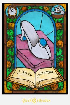 a stained glass window with an image of a book and a shoe on top of it