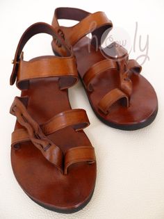 These beautiful sandals are already made so I can ship them to you immediately. Fantastic discounts for larger orders. Please contact me for further information on our amazing wholesale prices. 100% handmade sandals made from the finest quality full-grain leather. They are available in all sizes as we custom make them to your actual feet measurements. No machines are used in the making of my sandals. They combine style and functionality. An enormous amount of care and energy goes into making eac Brown Leather Barefoot Sandals, Artisan Leather Toe Ring Sandals With Open Toe, Artisan Leather Open Toe Sandals, Artisan Leather Toe Loop Huarache Sandals, Artisan Leather Toe Loop Sandals, Handmade Leather Toe Loop Sandals, Handmade Leather Toe Ring Sandals, Handmade Leather Artisan Sandals, Handmade Leather Huarache Sandals With Single Toe Strap