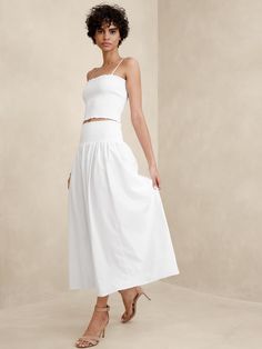 Smocked-Waist Poplin Maxi Skirt | Banana Republic Factory Tiered Skirt Bottoms With Pockets For Day Out, White Tiered Skirt With Pockets, Summer Cargo Skirt With Elastic Waistband And Relaxed Fit, Relaxed Cargo Skirt With Elastic Waistband For Summer, Summer Cargo Skirt With Elastic Waistband, Tiered Maxi Skirt With Pockets For Day Out, Relaxed High Waist Skirt With Elastic Waistband, High Waist Skirt With Elastic Waistband And Relaxed Fit, High Waist Skirt With Elastic Band