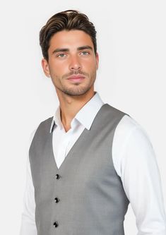 Look your best in the custom made Bryant Light Grey Twill Vest. This professional classic is designed to flatter and enhance any look. A timeless wardrobe staple, it's sure to be a reliable go-to item. Classic Gray Suits For Work, Modern Fitted Solid Suits, Classic Slim Fit Suits For Work, Classic Flat Front Suits For Office Wear, Classic Fitted Suits For Office Wear, Classic Fitted Suits, Classic Slim Fit Suits, Body Posture, Timeless Wardrobe