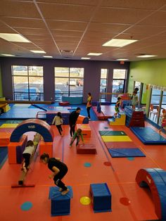 children playing in an indoor trampoline gym