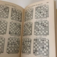 an open book with pictures of chess boards on it's pages and instructions for the game