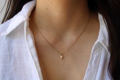 This delicate necklace is just perfect to wear on its own or layered with your favourite pieces! Pearls are also the birthstone of anyone born in the month of June. D E T A I L S *It features a single AA grade cultured white teardrop pearl. These measure between 4 and 5mm and have a smooth, even nacre. *It is suspended from a super dainty  stainless steel chain. Chain is available in 14k gold, rose gold and silver. *Stainless steel is very hard wearing and will not tarnish or oxidise. It is also Rose Gold Necklace With Pearl Pendant For Everyday, Everyday Rose Gold Necklace With Pearl Pendant, White Dainty Drop Necklace For Everyday, Dainty White Drop Necklace For Everyday, Elegant Teardrop Birthstone Necklace, Minimalist White Drop Necklace For Anniversary, Minimalist Drop Pearl Necklace, Elegant Tiny White Necklace, Everyday White Drop Necklaces