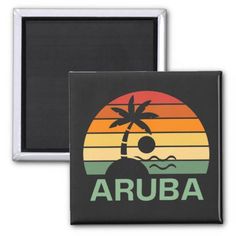 an orange and yellow sunset with the word aruba on it refrigerator magnets