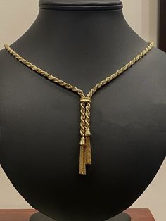 This Magnificent Piece of Jewelry is Retro, dating back to circa 1960's yet it's in remarkable condition Of Italian provenance,  designed as torsion (which translates as "twist" from French) / lariat chain,  this piece was typical for high class society of those days,  but quite extraordinary today.  Meticulously crafted in 9K Yellow twisted "rope" chain,  intertwined with a striking 9K white gold box chain  White & yellow gold contrast but compliment each other nicely  Secured by a secure & sol Luxury Vintage Jewelry With Rope Chain, Luxury Elegant Long Yellow Gold Necklace, Luxury Long Yellow Gold Necklace, Antique Gold Lariat Necklace, Vintage Lariat Necklace With Adjustable Chain For Gifts, Vintage Rope Chain Necklace For Formal Occasions, Vintage Rope Chain Necklaces For Formal Occasions, Vintage Adjustable Lariat Necklace As Gift, Vintage Yellow Gold Rope Chain Necklace