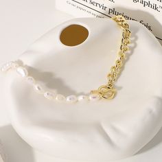 Indulge in sophistication with the Chic Pearl Contrast Necklace. A fusion of timeless pearls and modern design, this piece exudes elegance with its contrasting elements. Elevate any ensemble effortlessly with the allure of this chic and versatile necklace, a perfect balance of classic grace and contemporary style. 18k Gold Plated Stainless Steel Chain length - 43cm Tarnish free / Water resistant 💧 Jewelry Organizer Storage, Necklace Chain Lengths, Mens Beaded Bracelets, Original Jewelry, Pearl Set, Pearl Chain, Stainless Steel Earrings, Birthday Gifts For Women, Stainless Steel Necklace