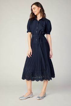 Framed by puffed sleeves, this midi dress has a pointed collar and a button-up half placket that lets you control the coverage. It's got crisp pleats that flow to a mid-length skirt with embroidered eyelets and a scalloped hem. Wear it cinched by the matching tie belt to highlight your waist. •Pointed collar •Button front placket •Short puff sleeves •Partially smocked cuffs •Optional tie belt •Pleated skirt •Scalloped mid-length hemDIMENSIONS •Standard: 48" Length Item number 2490204 65% POLYEST Eyelet Midi Dress, Mid Length Skirts, Print Trends, Eyelet Dress, Vacation Dresses, Sweater Sale, Puffed Sleeves, Scalloped Hem, Trending Dresses