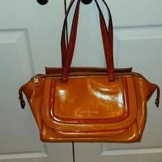 Brand New, Never Used, Like New Caramel Yellow/Orange Colors Color, Shiny, Has Extra Pockets On Front And Back, Shoulder Bag, Real Leather, Beautiful Bag, Any Questions Ask Real Leather Handbags, Caramel Color, Antonio Melani, Back Shoulder, Beautiful Bags, Yellow Orange, Leather Handbag, Orange Yellow, Real Leather