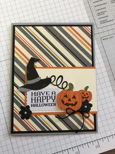 a close up of a card with a trick or treat on it and a paper pumpkin